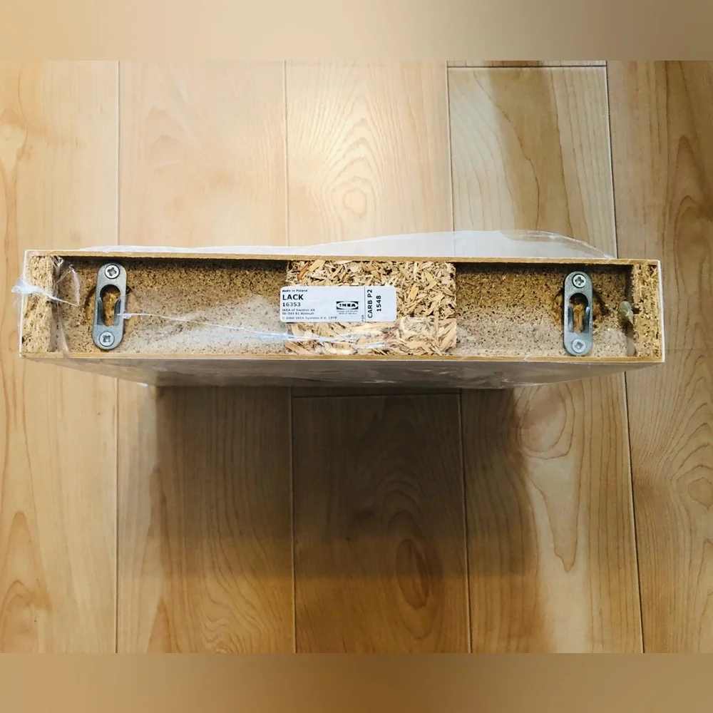 NWT. IKEA LACK white floating shelf design.